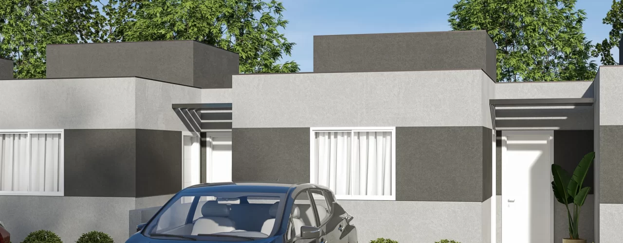 Fachada de casa térrea com linhas modernas em tons de cinza, jardim frontal florido e vaga com carro estacionado sobre piso drenante.