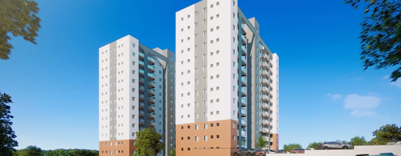 Fachada de condomínio com torres residenciais brancas e cinza vistas durante o dia, carros estacionados à frente e céu azul claro ao fundo, transmitindo sensação de modernidade e tranquilidade.